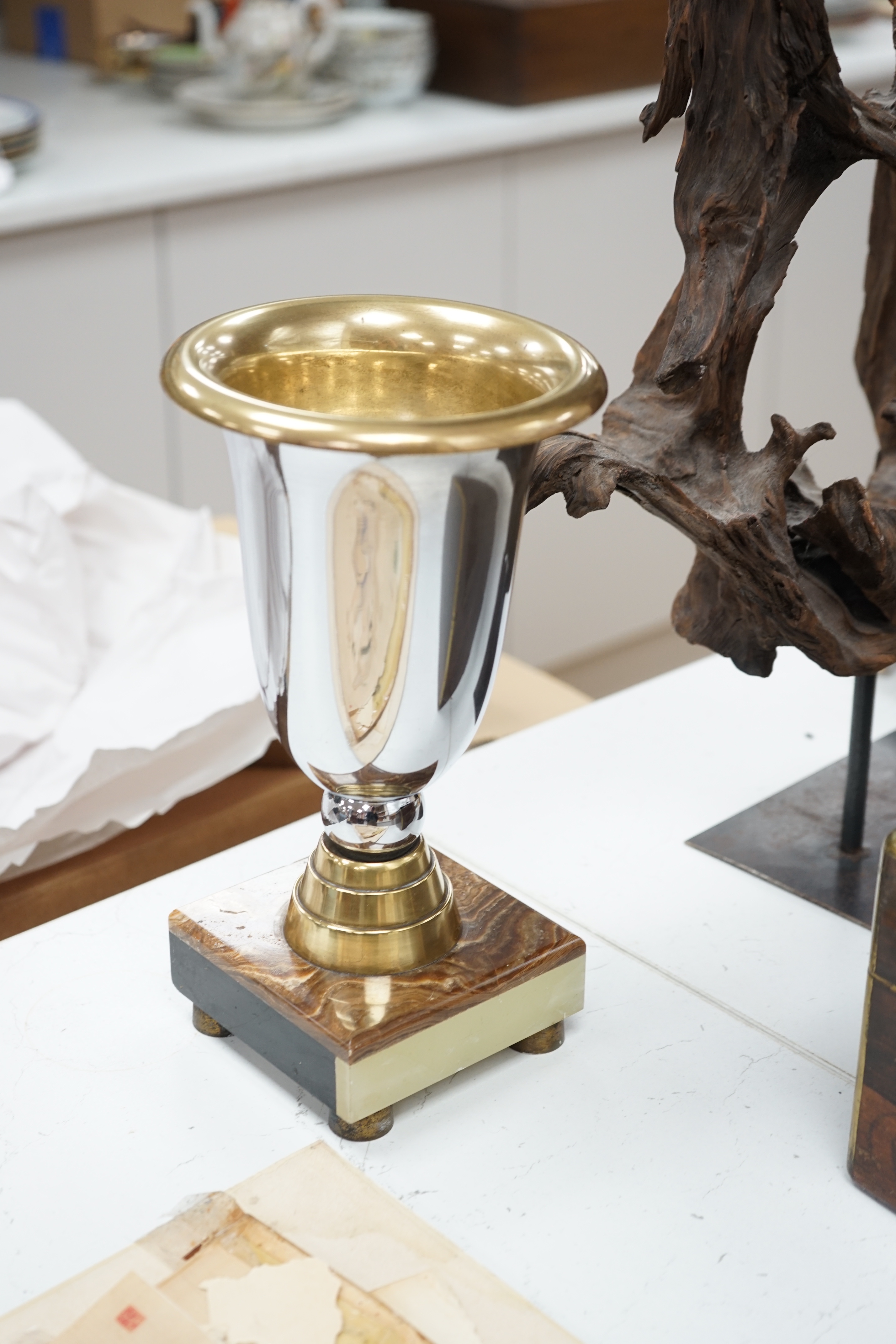 A French chrome, bronze and marble Art Deco 4 glass clock with two pedestal vase garnitures and a Wolf mount, attributed to Michel Decoux